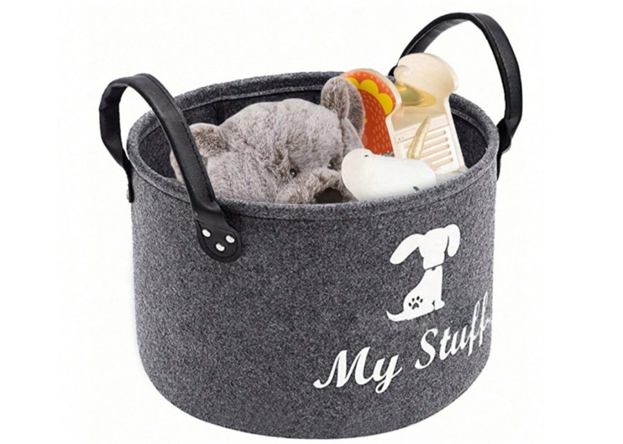 A close-up of different dog toy basket materials like felt, canvas, and cotton rope.