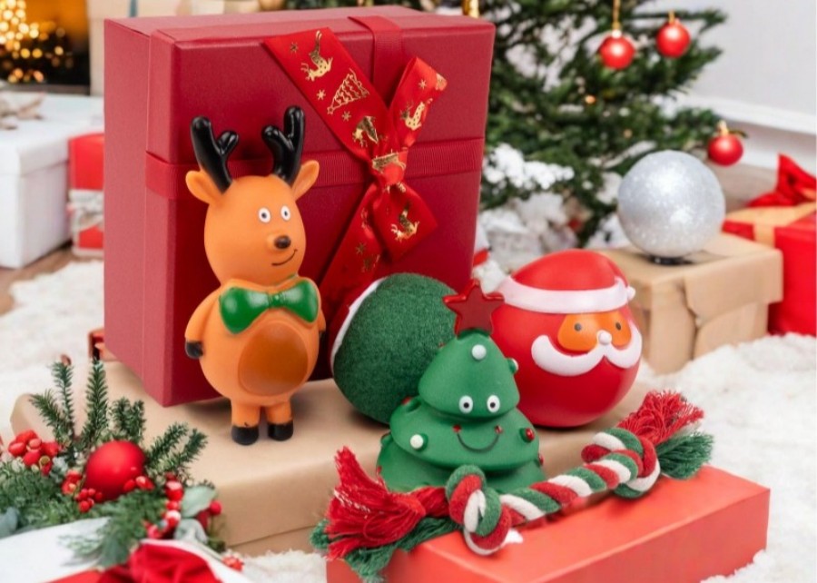 A collection of festive Christmas-themed dog toys.