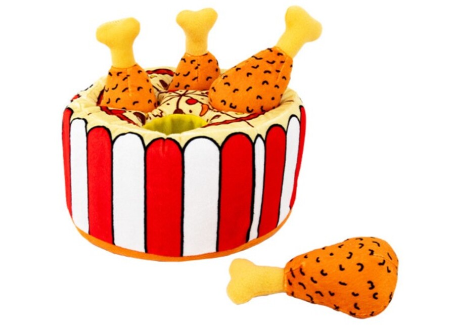 A plush log toy with several holes from which small plush squirrels can be pulled out.