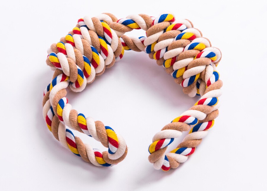 Durable multi-colored cotton rope dog toy with knots for tugging and heavy chewing.