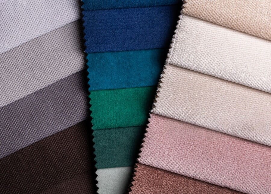A close-up of different plush toy fabrics like corduroy and canvas