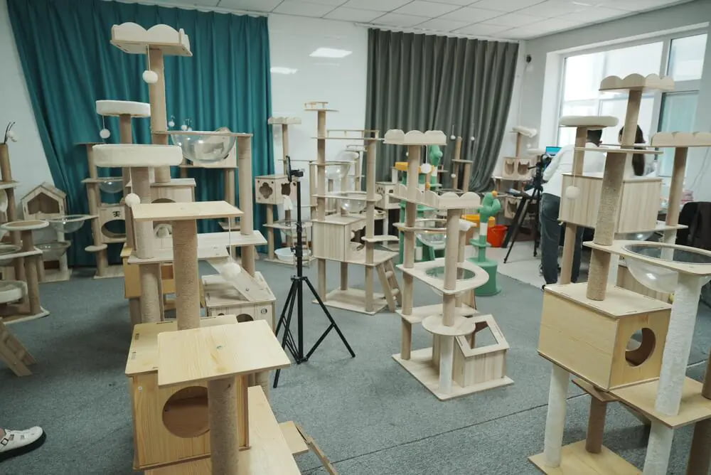 Warehouse inventory of small and cute cat trees ready for wholesale distribution