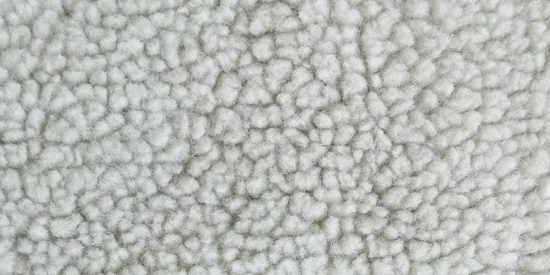 Close-up of Sherpa Berber Fleece simulating natural wool texture