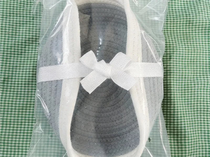 Flat-folded cotton rope dog toy baskets prepared for shipping