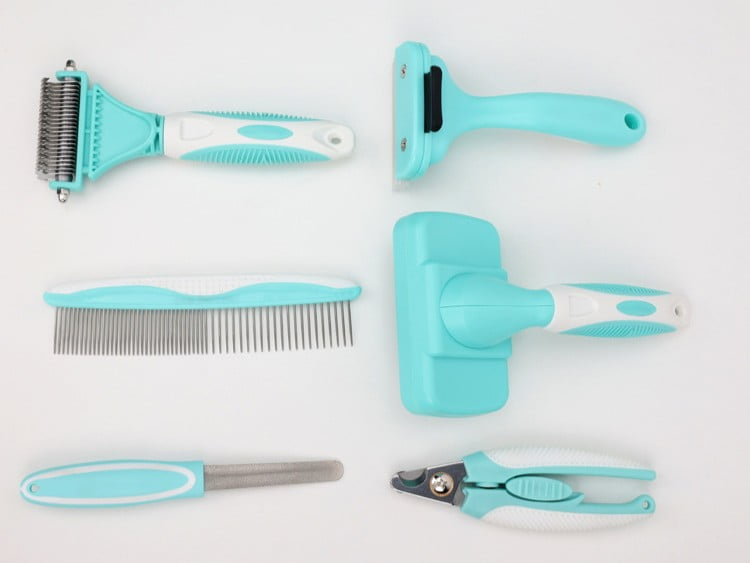 Colorful pet brushes with Pantone matched TPR grips and bodies