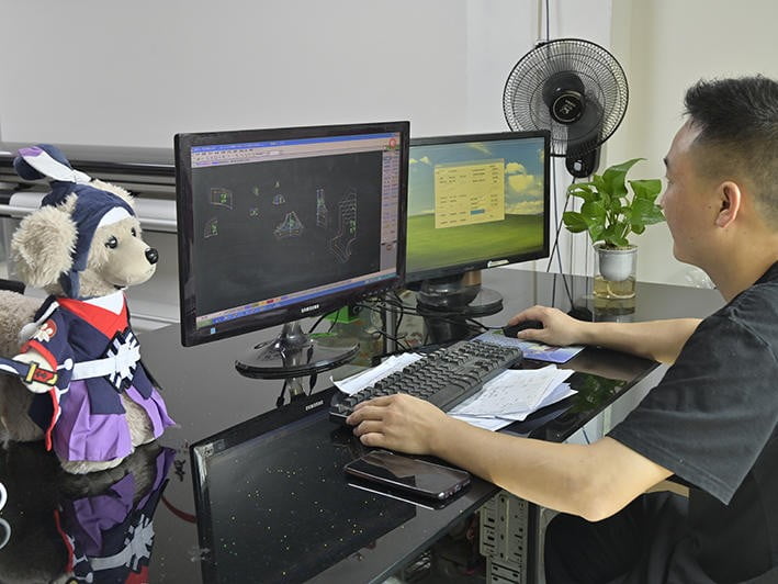 R&D team working on pet clothing design