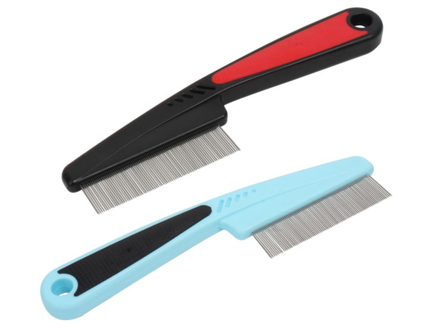 Close-up of flea doctor comb with ultra-fine teeth for pest removal