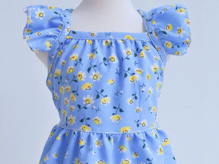 Custom printed pet dresses with exclusive floral and monogram patterns