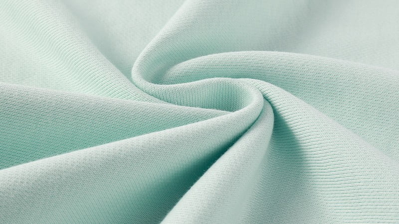 Close-up texture of Premium French Terry fabric for pet hoodies showing loopback structure