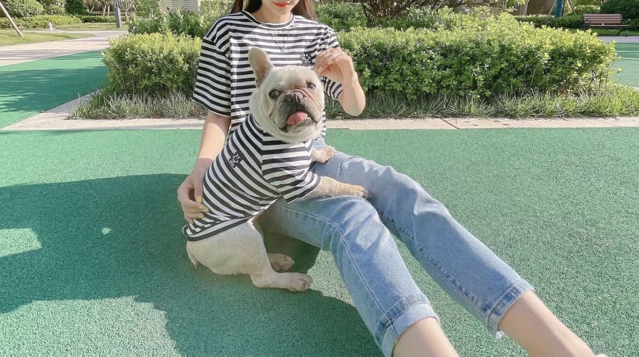 Owner and dog in matching t-shirt