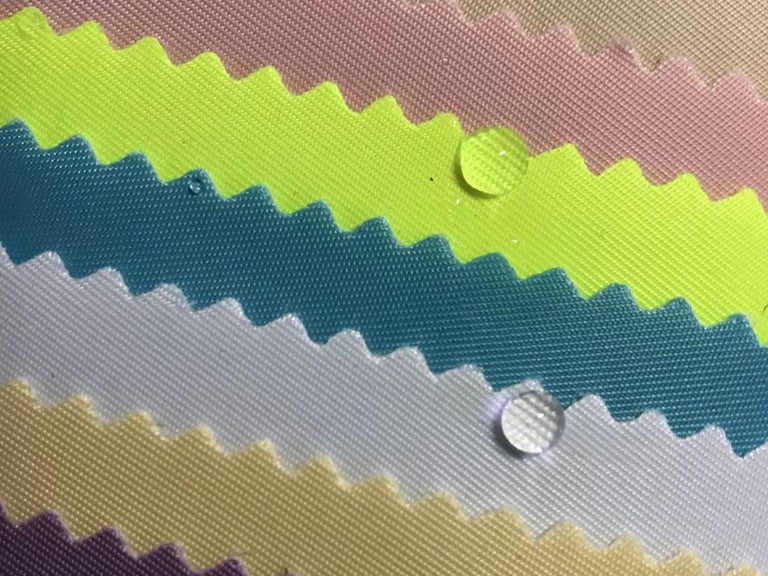 Pantone Matched Fabrics and Thermal Liners for Pet Apparel