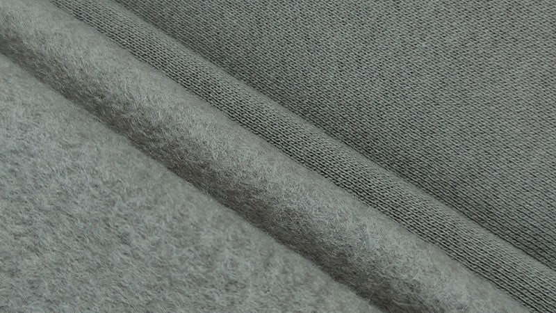 Heavyweight 320gsm poly-cotton fleece hoodie fabric with structured silhouette