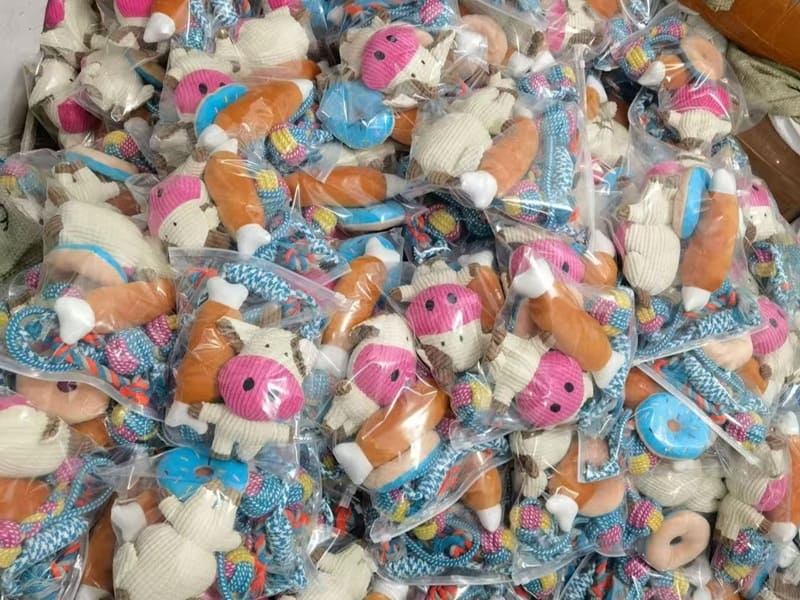 Pet product packaging photos prepared for wholesale order review
