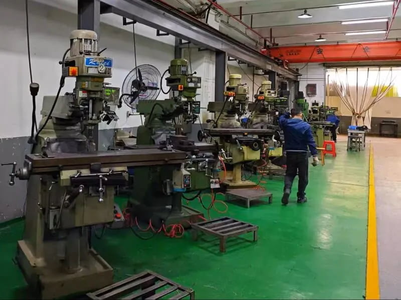 Mold machining workshop for custom molded dog toy development