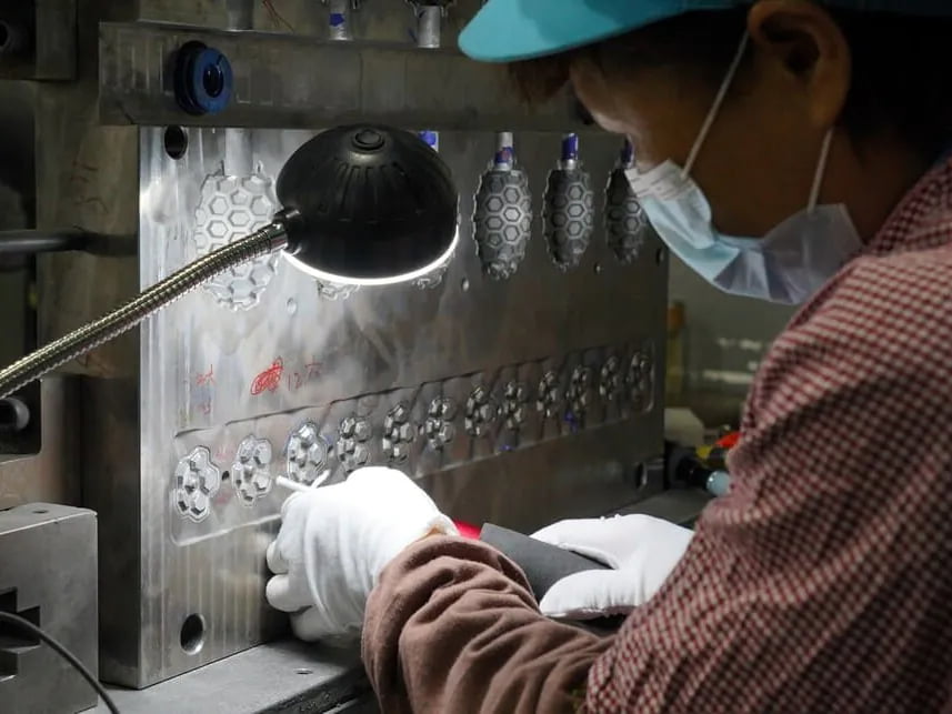 Mold review and adjustment for custom rubber dog toy production