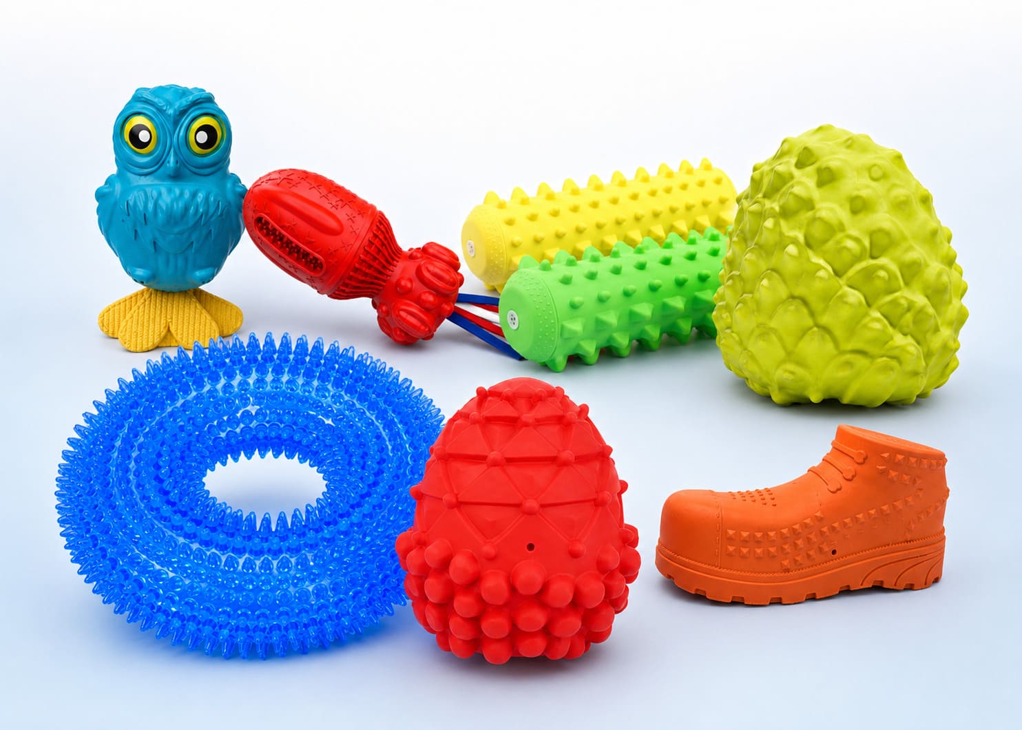 Squeaky molded dog toys with reviewed shell and material options