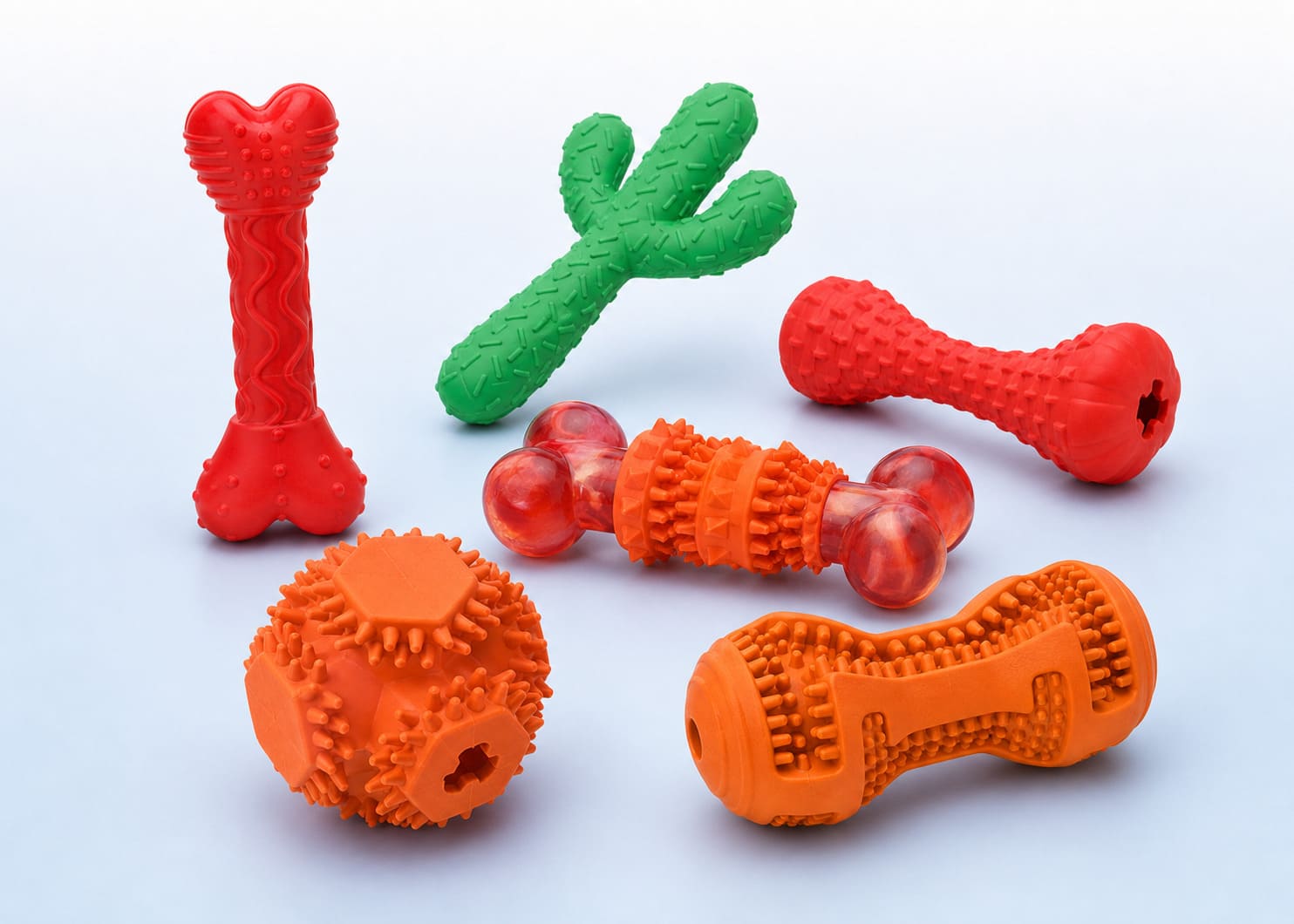 Textured molded chew toy designs with grooves ridges and grip areas