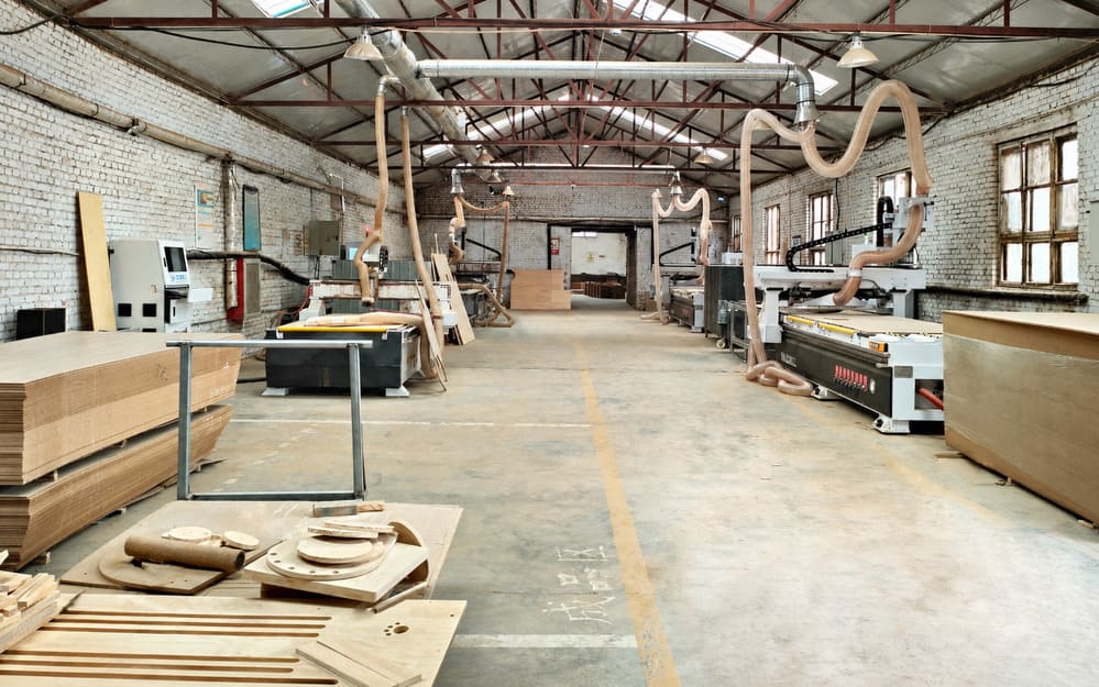 CNC equipment used to cut and drill wooden components for cat tree production
