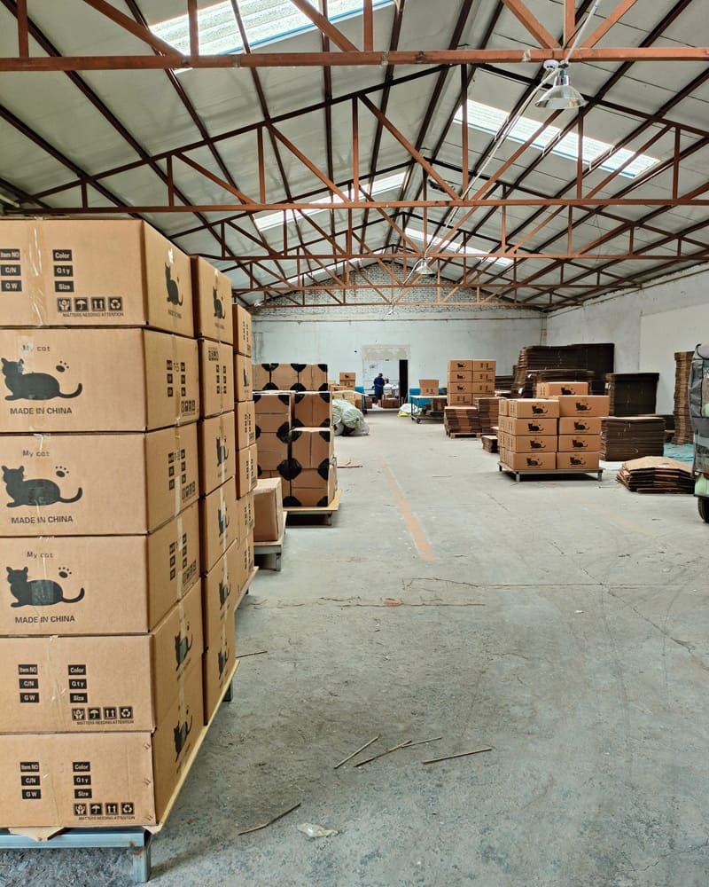 Packed cat tree cartons stored in a warehouse before shipment