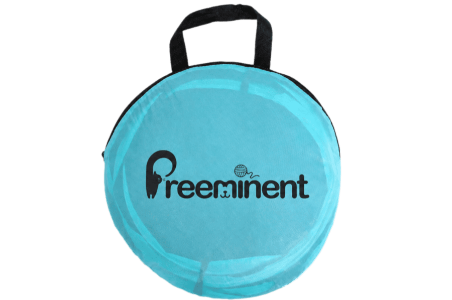 Blue collapsible cat tunnel folded into a round zippered storage bag with carrying handle