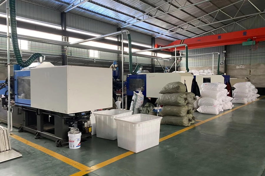 Injection molding workshop used for plastic cat ball production
