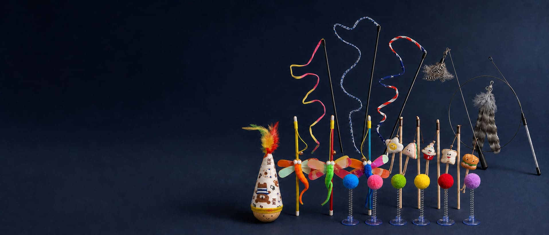 Wholesale interactive cat toys including wands, teasers, springs, feather toys, and refill attachments