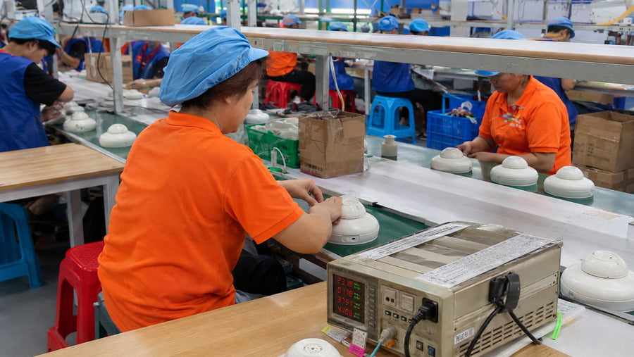 Automatic cat toy units undergoing functional quality inspection