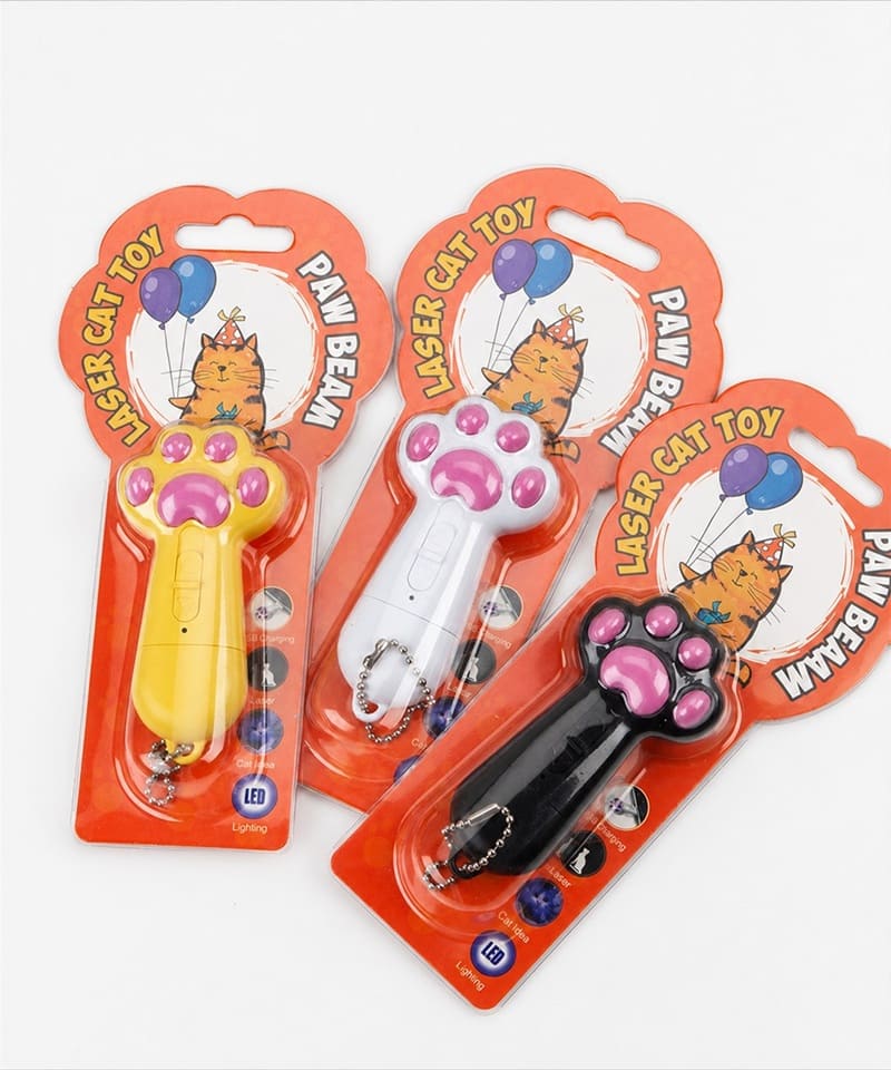 Three paw-shaped cat laser toys in blister card packaging