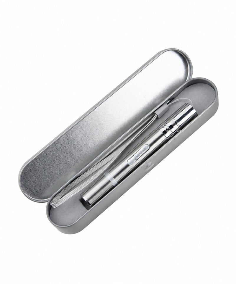 Open metal gift tin containing a silver cat laser pointer