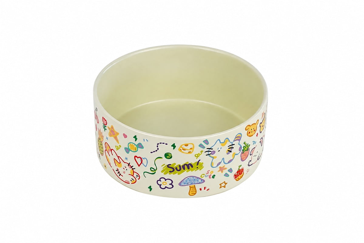 Cream ceramic pet bowl decorated with colorful animal and fruit patterns