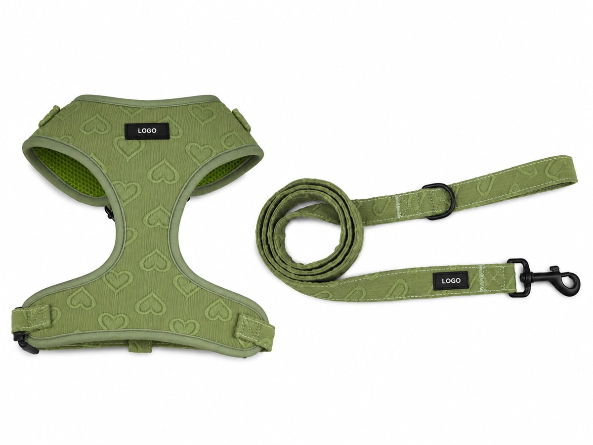 Olive green heart-pattern dog harness and leash set with mesh lining and LOGO labels.