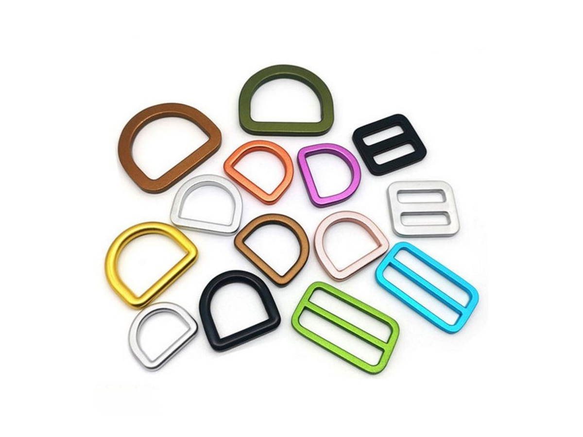 D-rings and rectangular strap adjusters in assorted colors for dog leashes