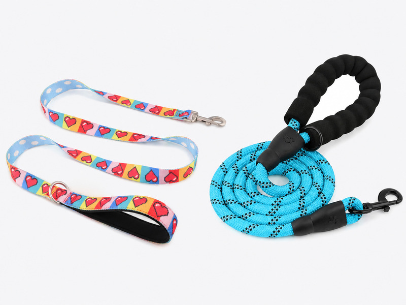 Flat webbing and round rope dog leashes with padded loop handles and snap hooks