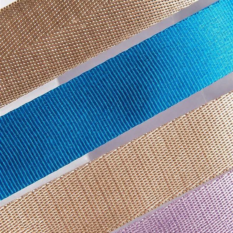 Nylon webbing in blue, beige and light purple showing woven textures for pet harness straps.
