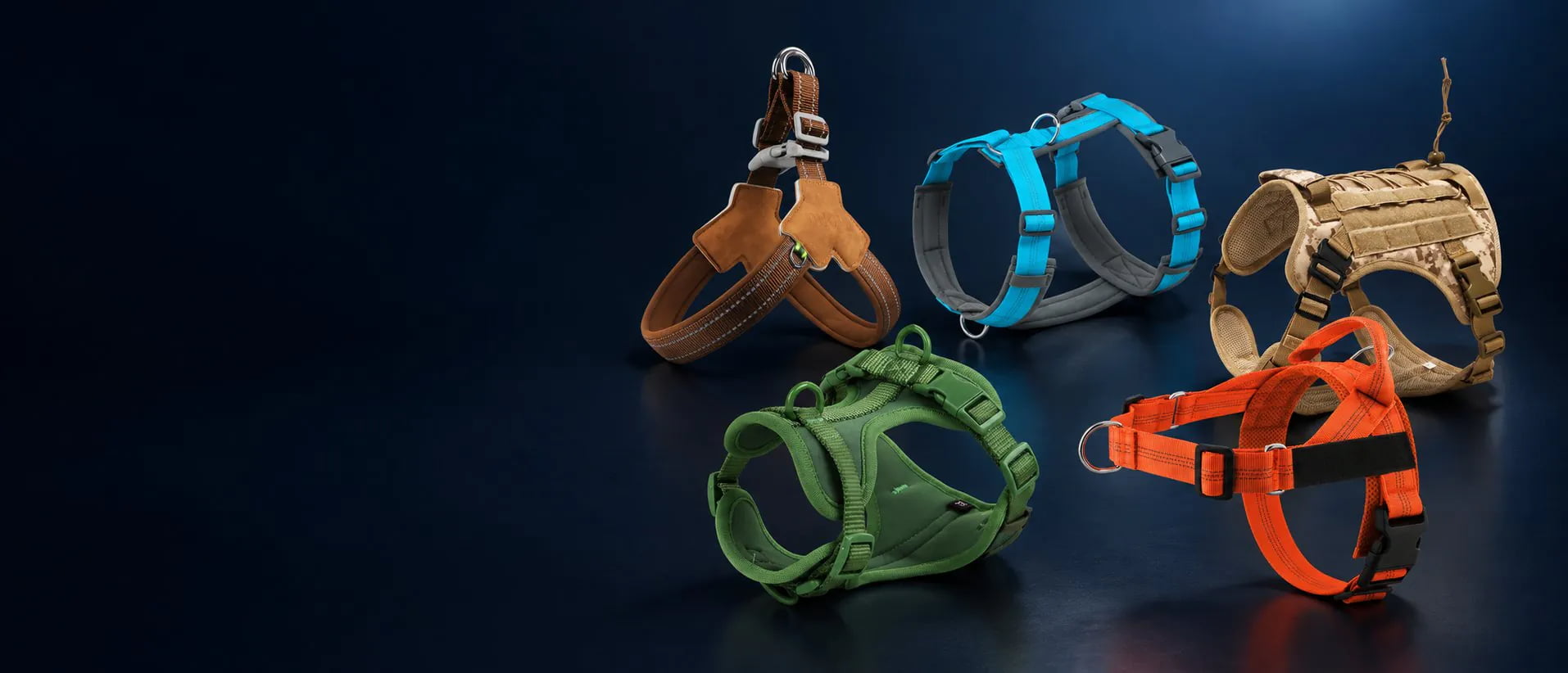 Webbing and padded harnesses in brown, blue, green, camouflage and orange from pet harness manufacturers.