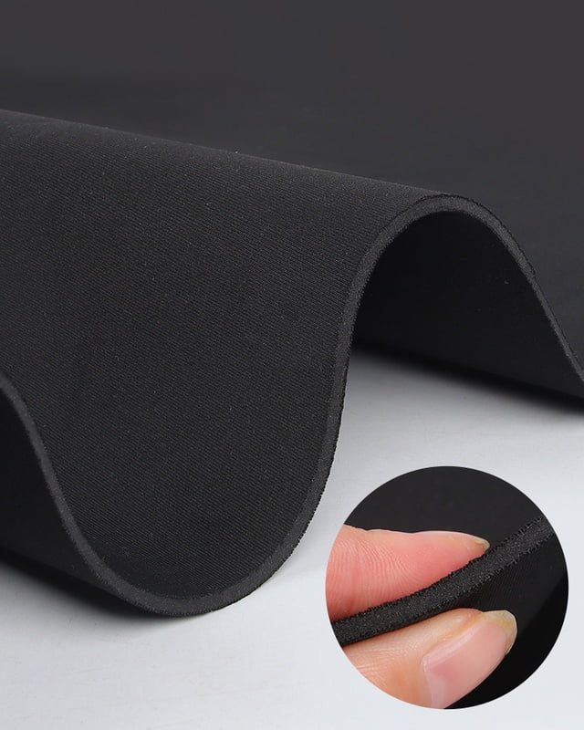 Black neoprene padding bent to show its fabric surface and foam edge, with an inset thickness close-up.