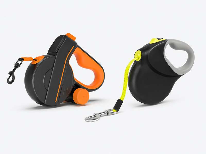 Two retractable dog leashes with handheld housings, top control buttons and snap hooks