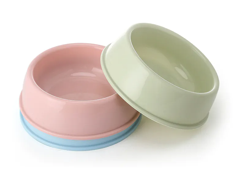 Pastel pink, blue and green plastic pet bowls for dogs and cats