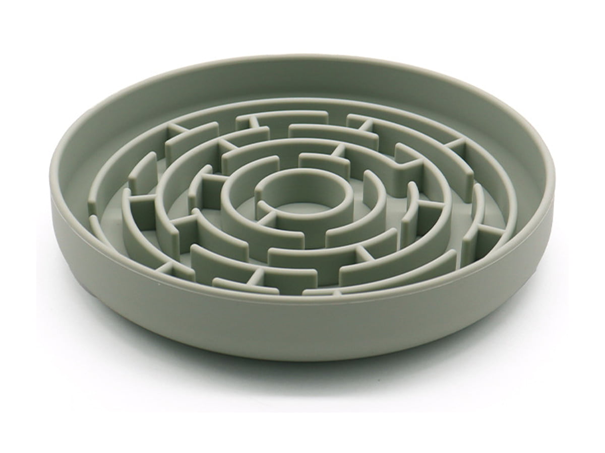Round green slow-feeder pet bowl with raised circular maze ridges
